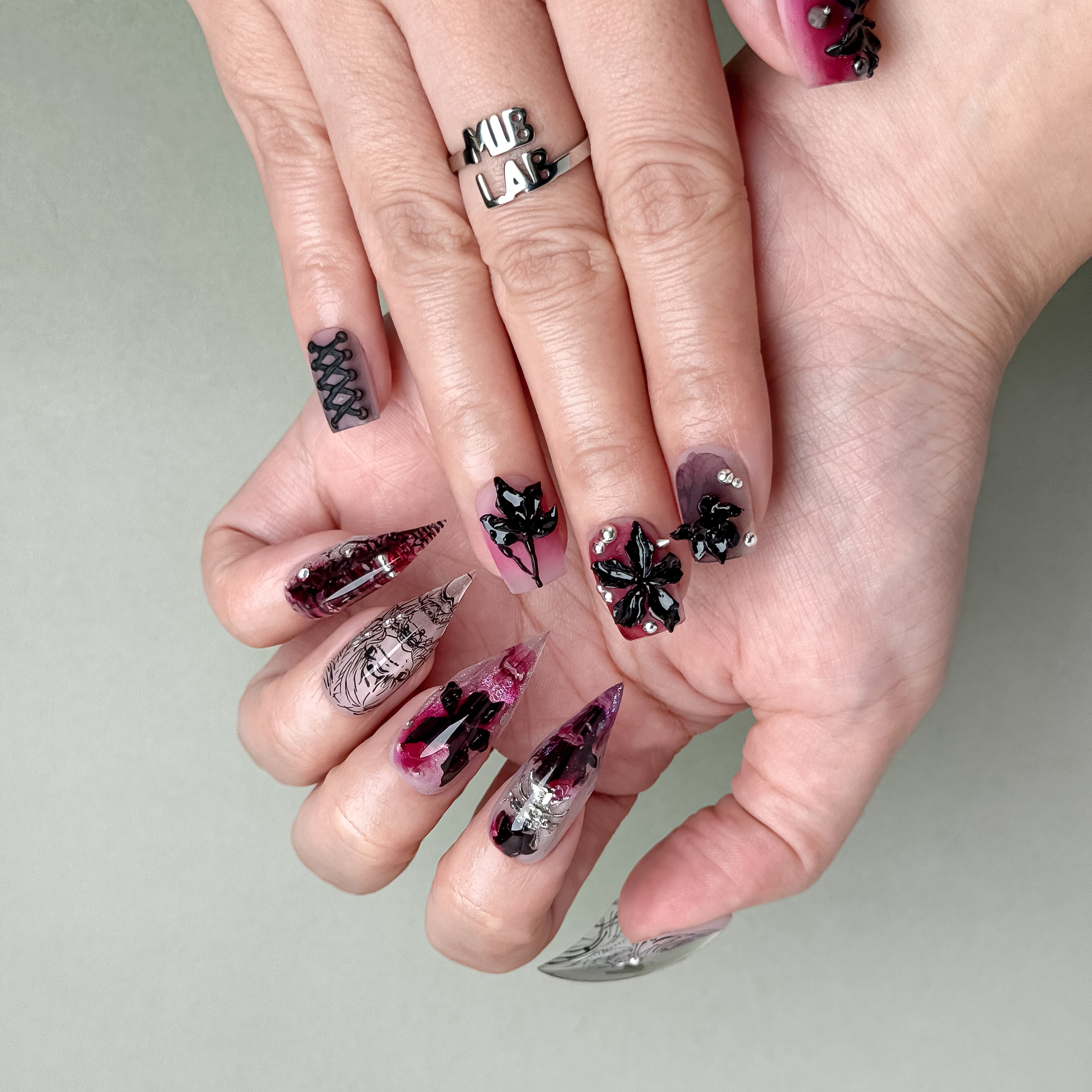 Another angle showing nail texture and reflective finish
