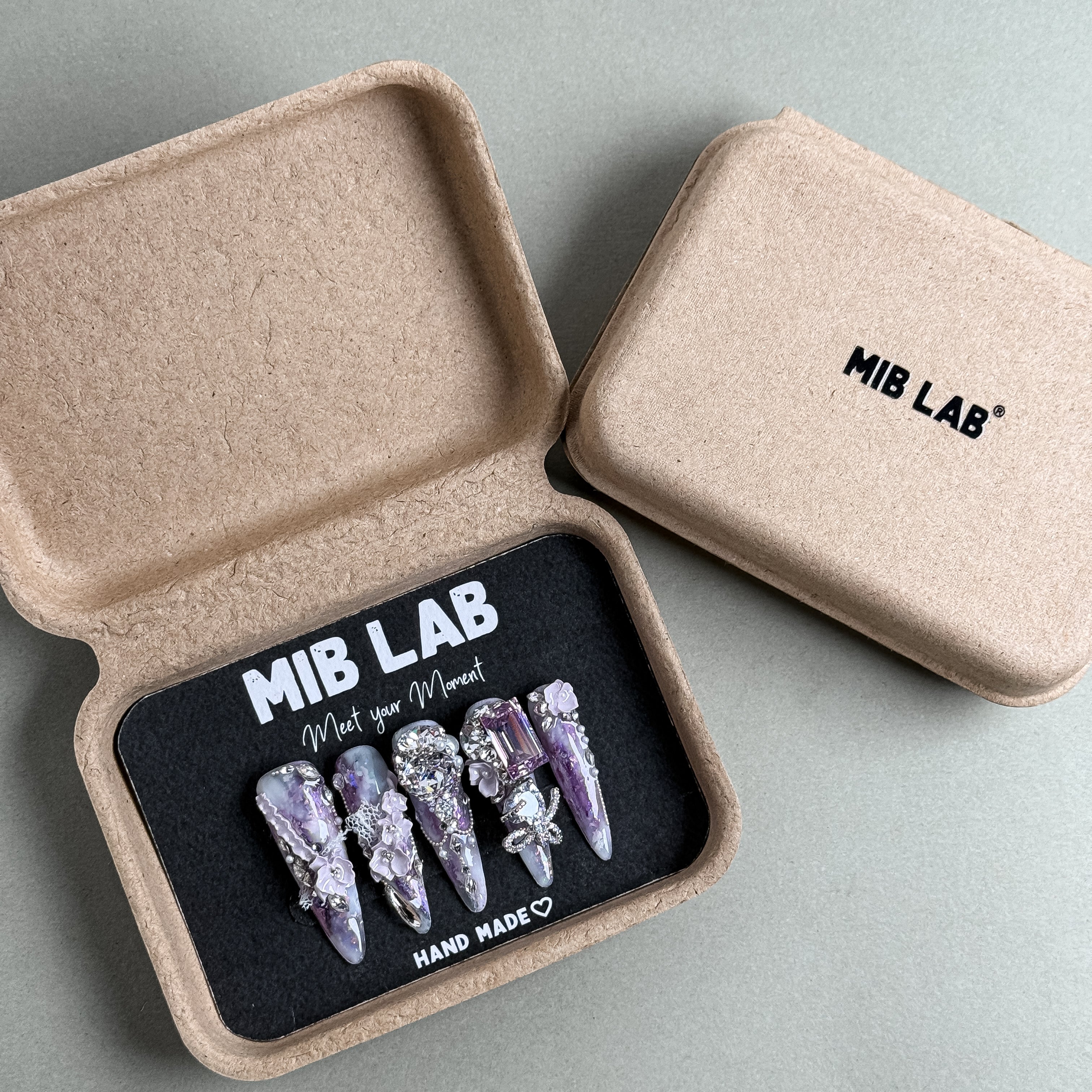 MIBLAB packaging box showing the At Last Swarovski nail design