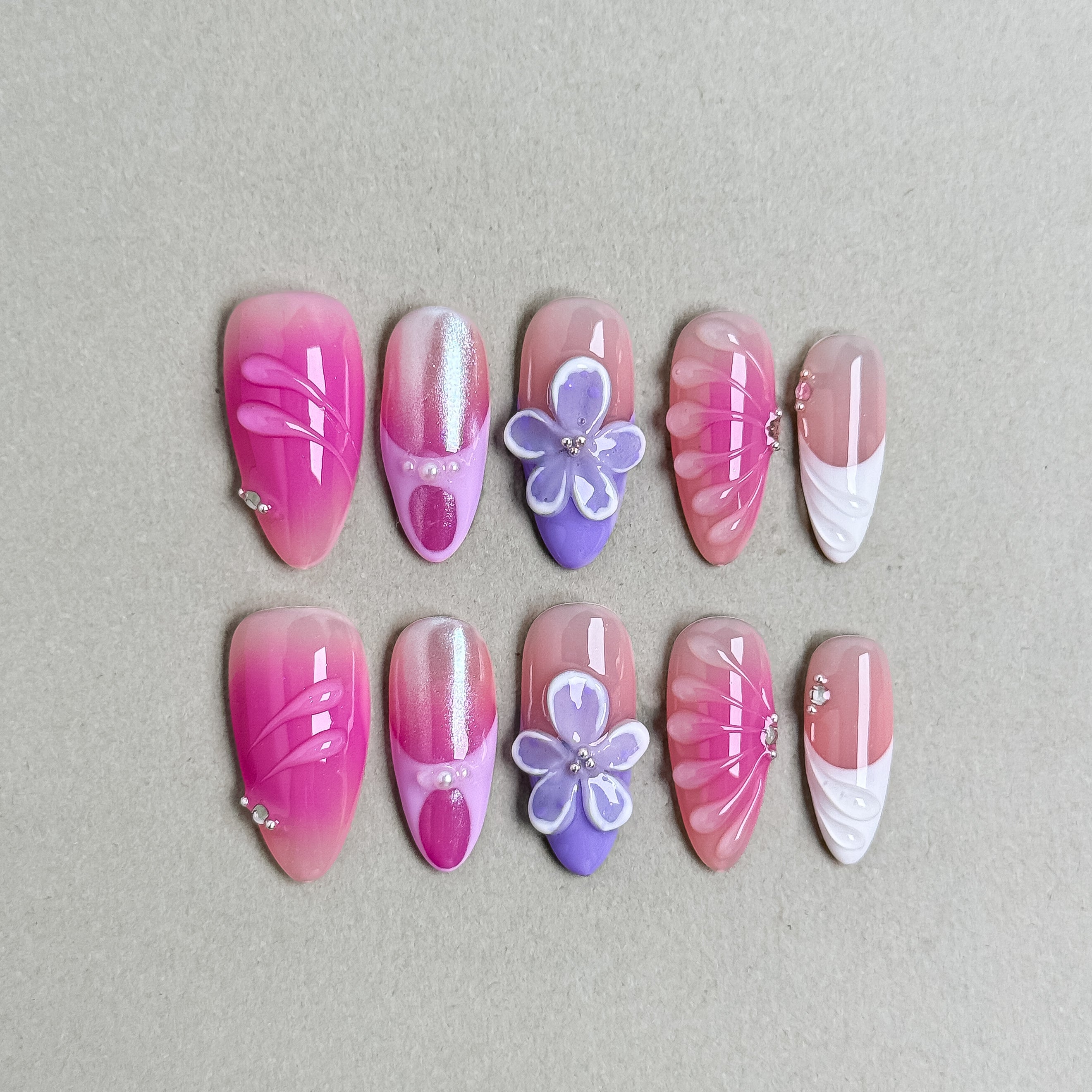 Pink and white ombr¡§| press-on nails with purple 3D floral accents