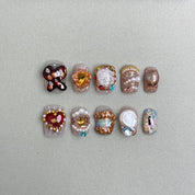 Heir : faux ongles réutilisables multicolores style bijou, motifs floraux et perles, accents dorés, press on nails premium.