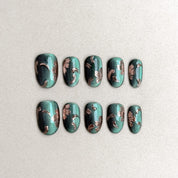 Jade : faux ongles réutilisables vert jade avec accents bronze, effet marbré, press on nails premium, finition brillante.