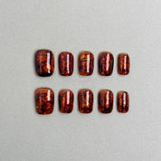 Oat Latte : faux ongles réutilisables brun moka translucide, effet écaille, press on nails premium, finition brillante.