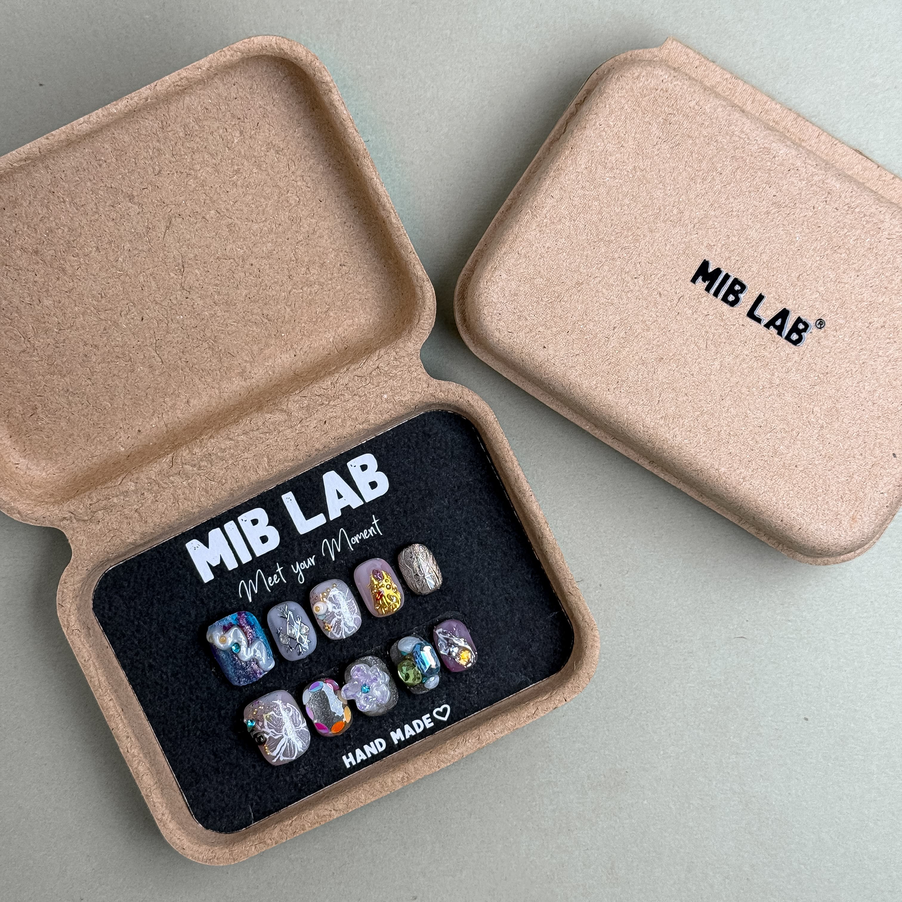 Open Air faux ongles multicolores premium MIBLAB dans boîtier, press-on nails réutilisables Genève