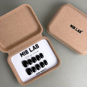 Ink faux ongles noirs premium MIBLAB dans boîtier, press-on nails réutilisables Genève